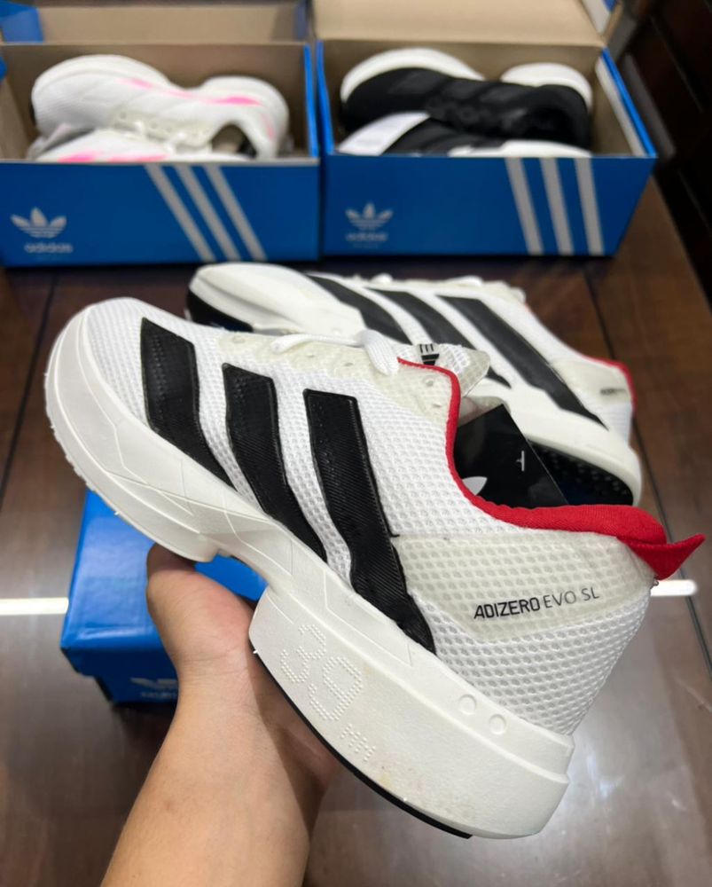 Tênis Unissex Adizero EVO SL Premium