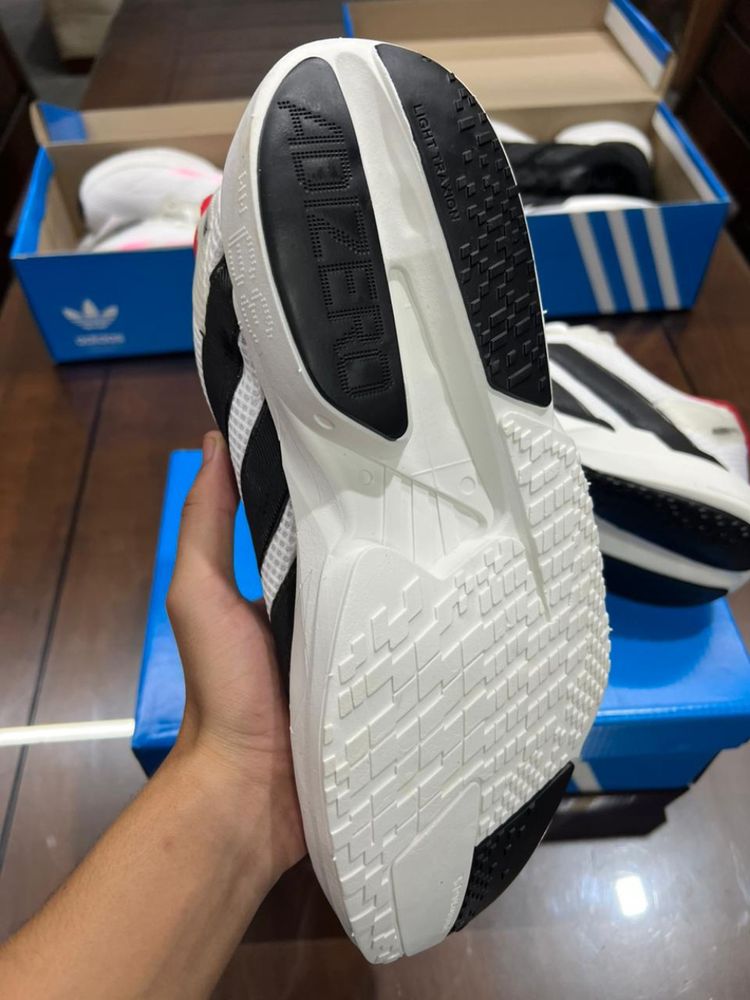 Tênis Unissex Adizero EVO SL Premium